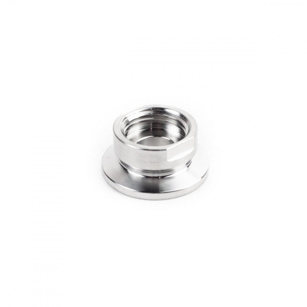 En Brewtools TC34 mm til 1/2" BSP(P)-mutter med flat, bred base og pakningsspor, vist på hvit bakgrunn.