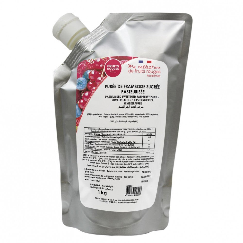 1 kg Bringebærpuré fra Fruits Rouges & Co, i sølvfarget emballasje med tut og flerspråklig etikett.