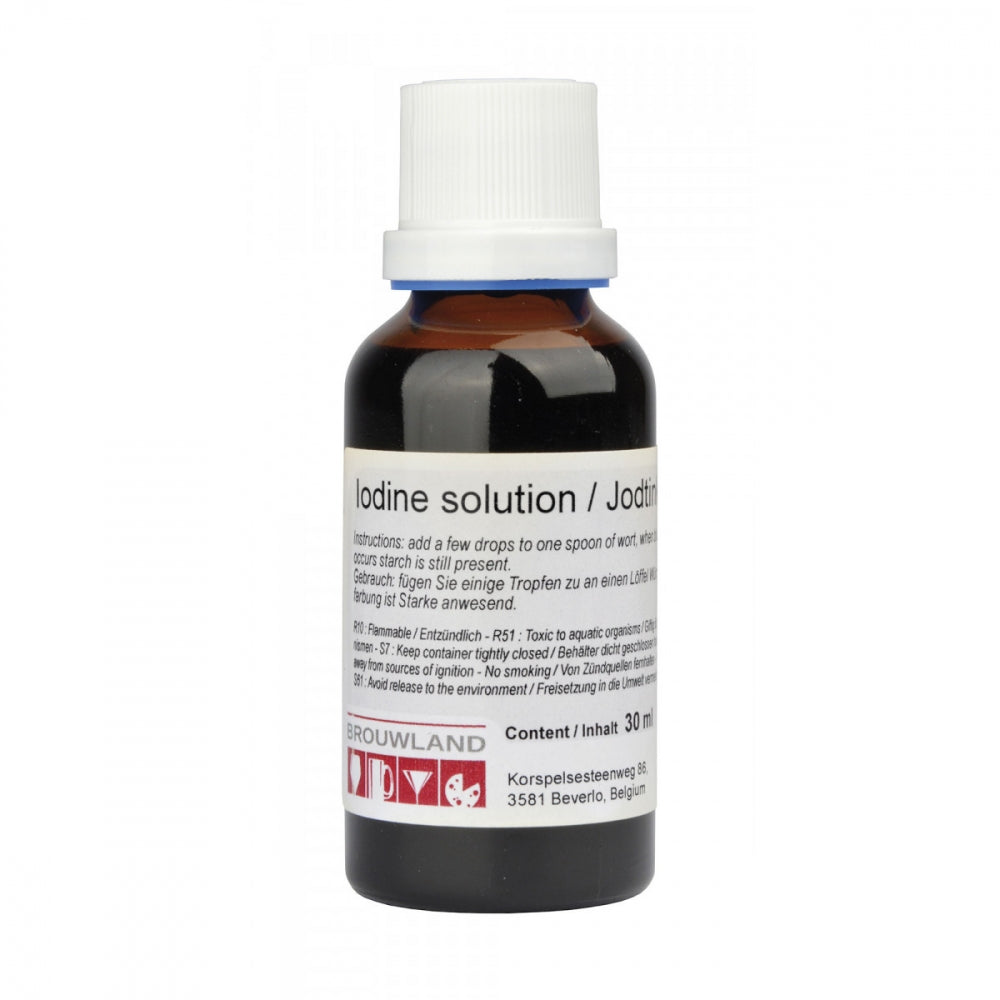 En brun glassflaske (30 ml) med "Jod for test av stivelse i vørter" fra Brouwland, med hvit etikett og blått lokk, med instruksjoner, advarsler, produsentopplysninger og egnet for jodtest eller mesking.