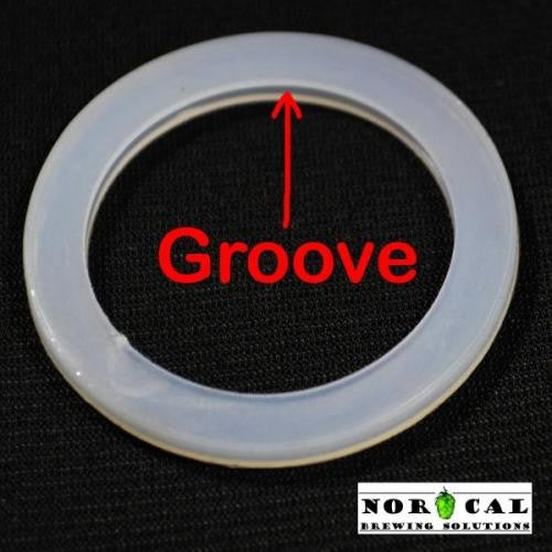 En gjennomskinnelig silikonring med spor, merket med en rød pil og "Groove"; Norcal-logoen i nederste høyre hjørne. Ekstra silikonpakning til Norcal-produkter for Speidel.