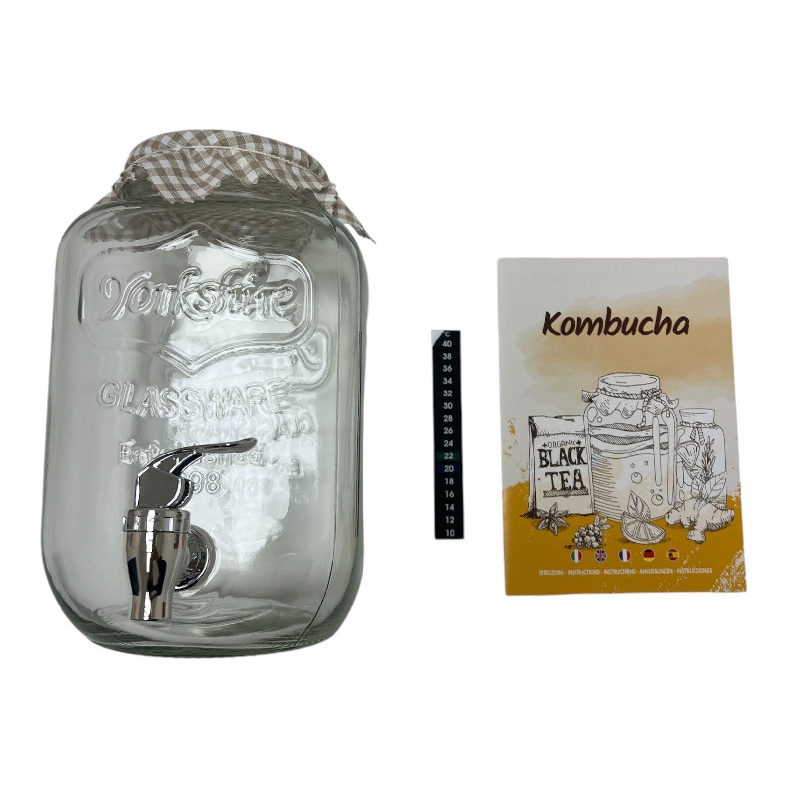 Kombucha Bryggesett 4L - Kontinuerlig fermentering inkluderer en glassdispenser med metalltapp, stofftrekk, målestripe og et illustrert instruksjonshefte - ideelt for kontinuerlig fermentering og hjemmebrygging av kombucha.