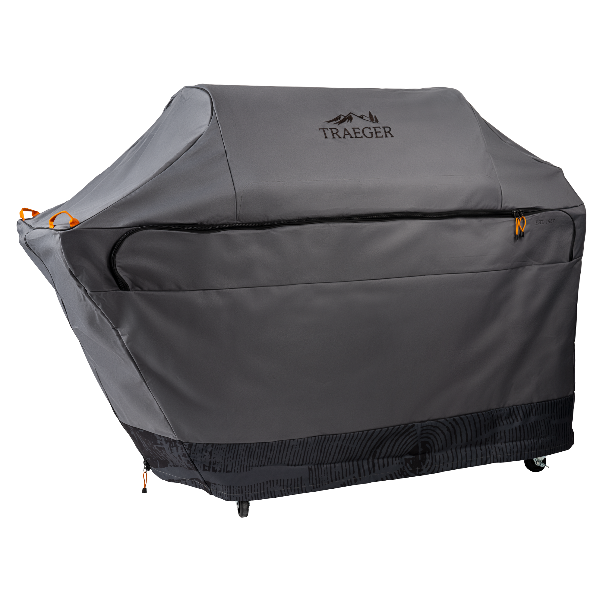 Et stort grått Traeger Full Length Grill Cover for Timberline XL med oransje glidelåstrekk, produsert av Traeger, passer over en grill på hjul på en vanlig hvit bakgrunn. Dette værbestandige trekket beskytter grillen din i all slags vær.