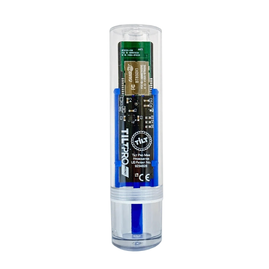 A transparent cylindrical Tilt Pro Mini Hydrometer & Termometer with certification symbols and a blue base. Visible internal electronics indicate it's ideal for digital hydrometer readings, perfect for hjemmebrygging enthusiasts.