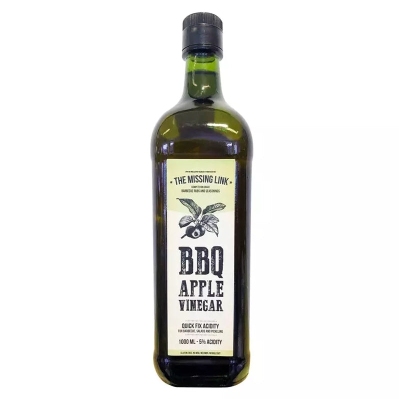 En 1 liters grønn glassflaske med The Missing Link BBQ Eple Eddik epleeddik (5 % syre), ideell til marinadesprøyting. Med The Missing Link-merkevare og etikett på forsiden.
