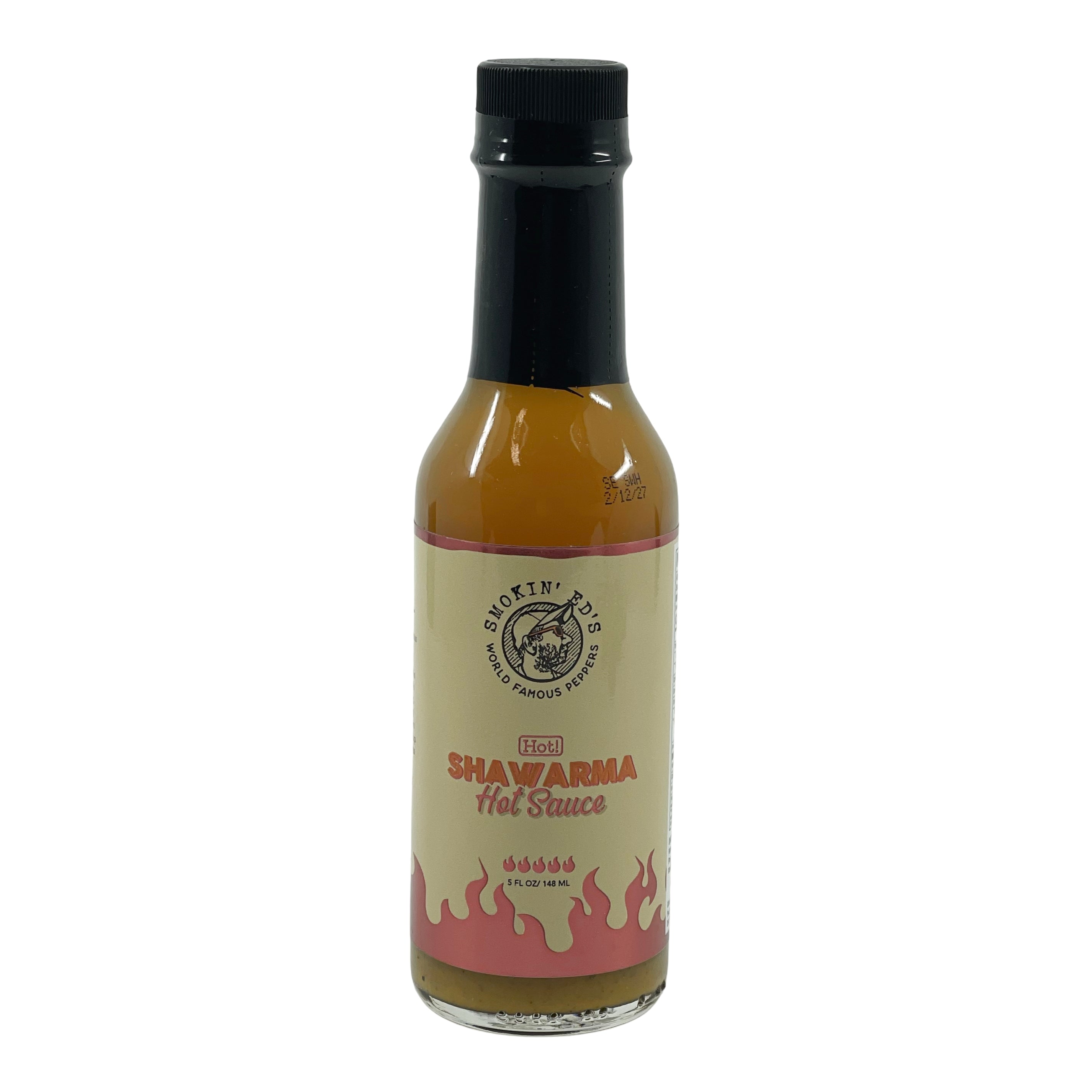 En flaske Smokin´Ed´s Shawarma Hot Sauce fra PuckerButt Pepper Company med svart hetelokk og en etikett med flammer, hetenivå-ikoner og sterke chilipulvernoter for ekte fans av krydret pølse.