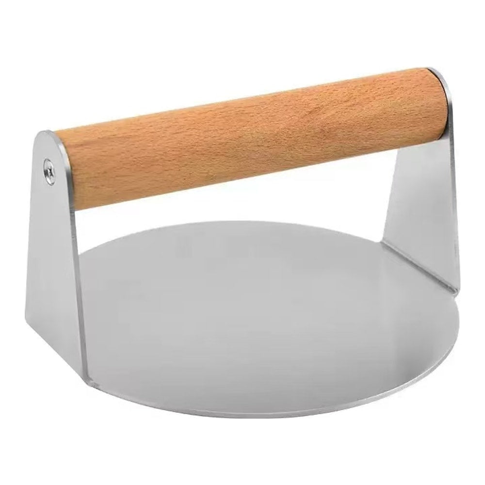 Stainless steel smash burger press with wooden handle, side view