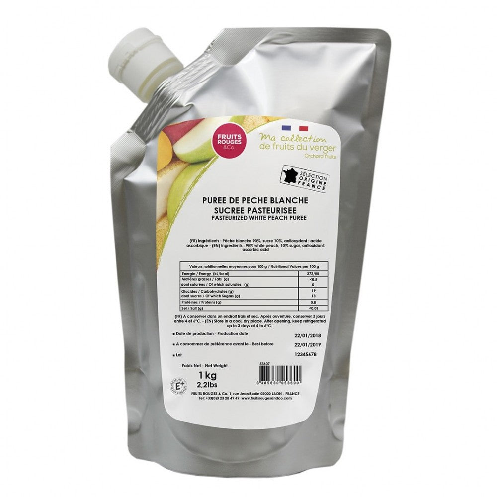 En 1 kg-pose med Ferskenpuré fra Fruits Rouges & Co, med pasteurisert søtet hvit ferskenpuré med en fransk etikett som viser næringsinformasjon og produktdetaljer.