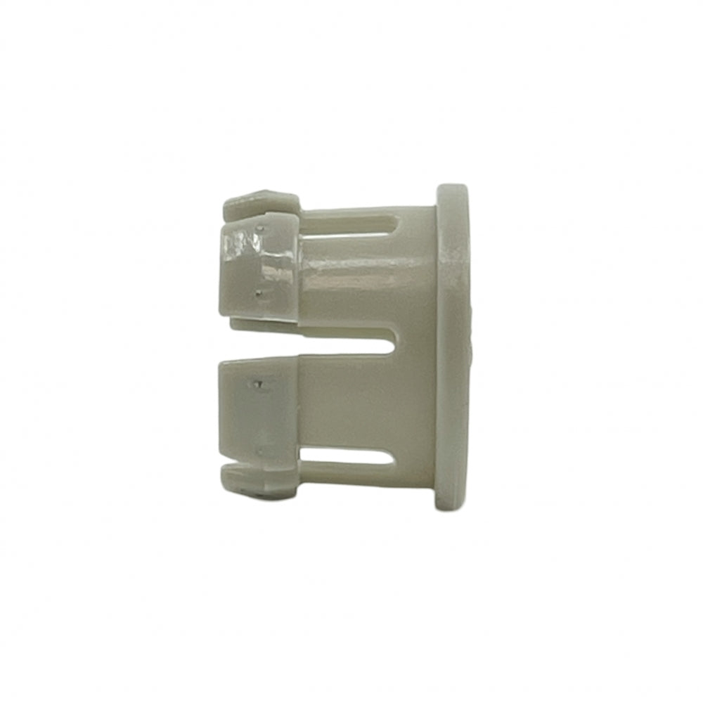 Dmfit John Guest / DMfit Spare Collet 1/2" er et lite, sylindrisk plastfeste med slissede sider og en flat, sirkulær base, utformet som en reservespennhylse. Avbildet mot en hvit bakgrunn.