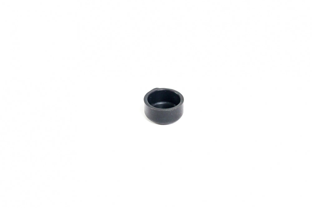 Brewsssential BrewSSSiphon Check Valve Cap er en liten, rund, svart reservedel i plast eller gummi som vises mot en vanlig hvit bakgrunn.