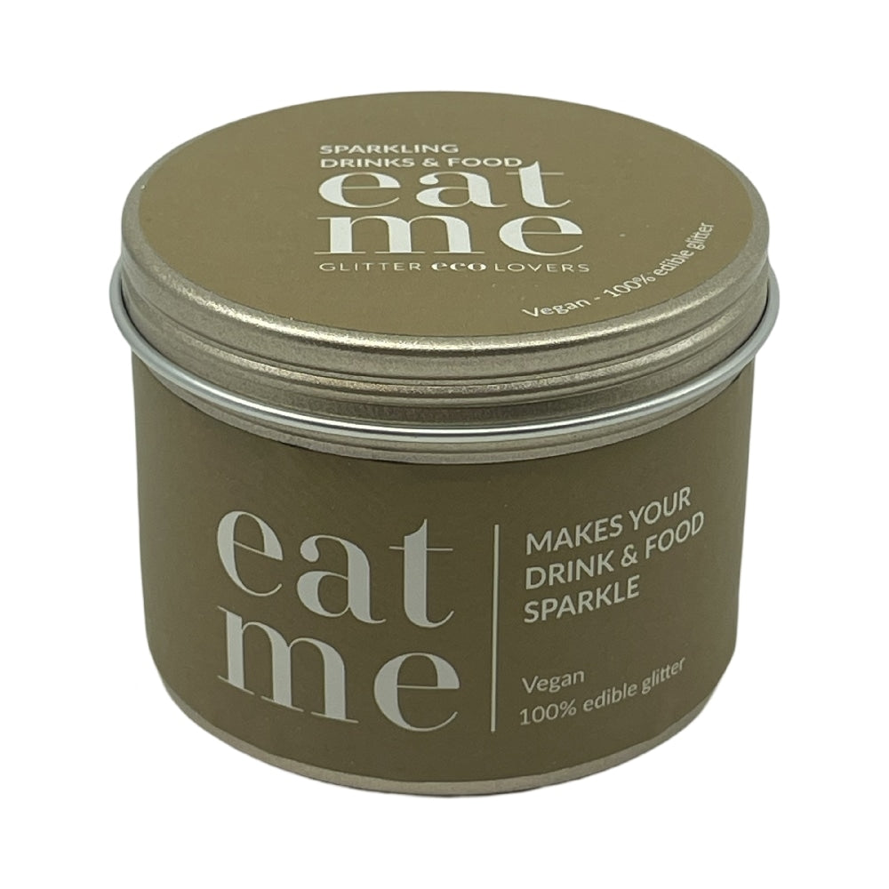 En rund gullbeholder merket "Eat Me Glitter Gold 150ml" fra Eco Lovers, med vegansk, 100 % spiselig glitter som gir glitter til mat og drikke.