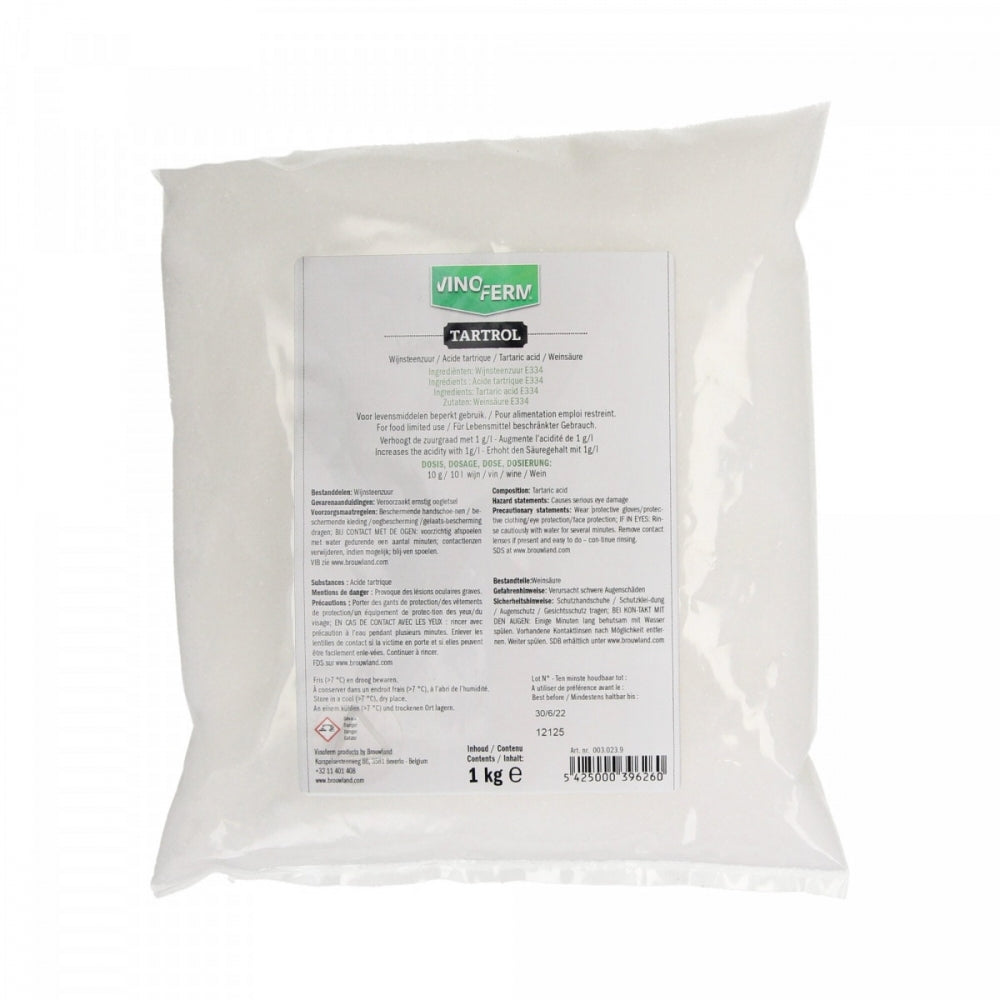 En 1 kg forseglet pose med Vinoferm Tartrol vinsyre fra Vinoferm, et hvitt pulver for dosering og justering av surhetsgraden i vin, med flerspråklig produktinformasjon og instruksjoner på frontetiketten.