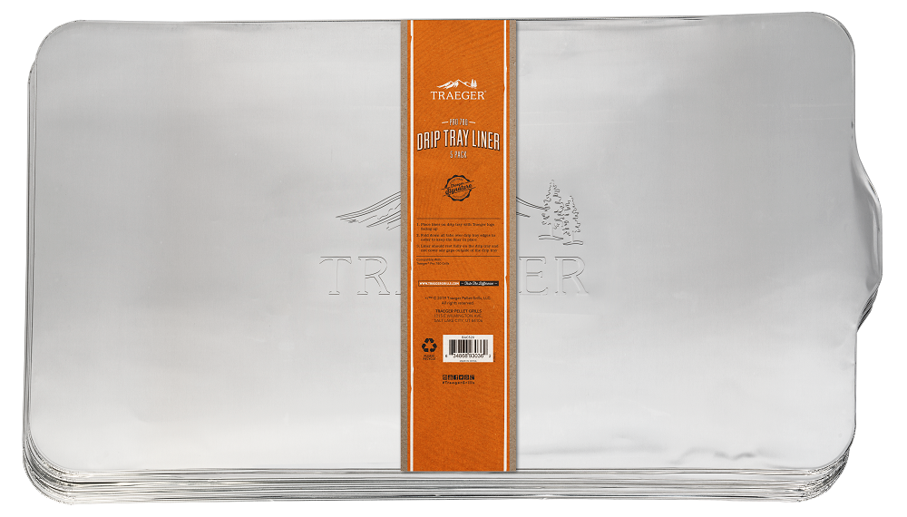 Stabel med Traeger Drip Tray Liner Pro 780 - Folieunderlag med oransje Traeger-etikett i midten - ideelt for å holde Pro 780-grillen ren.