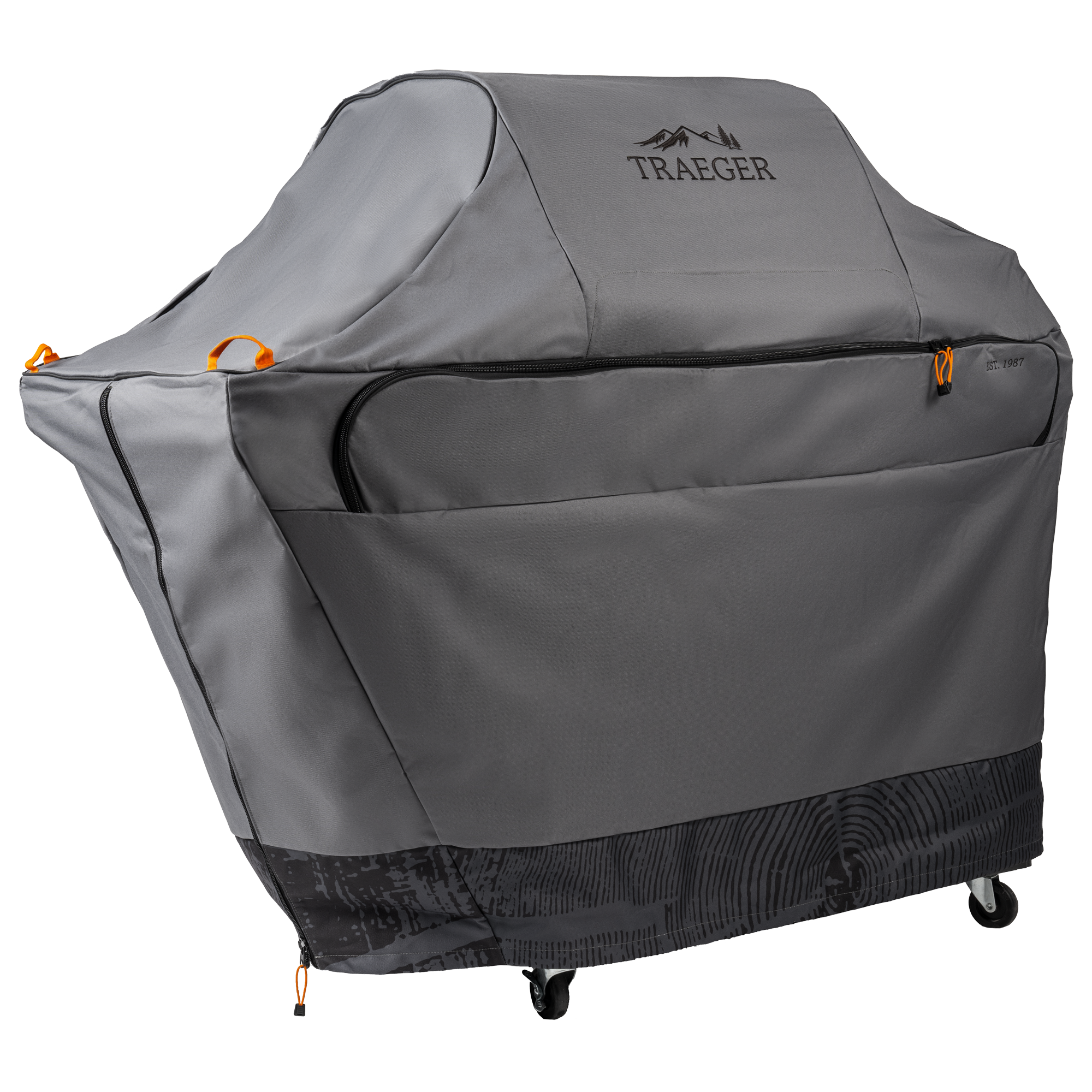 Traeger Full Length Grill Cover for Timberline L har slitesterkt grått stoff med oransje aksenter, en trykt bunn og Traeger-logoen på toppen - for varig beskyttelse av grillen din utendørs.
