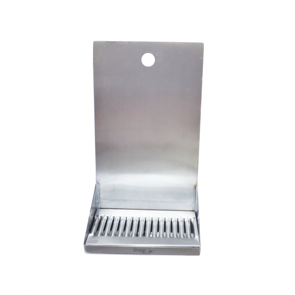 Krome Dispense Shank Mounted Drip Tray for 1 kran har en konstruksjon i rustfritt stål, en rist med slisser og et topphull for montering. Størrelse: 20 cm bredde x 15 cm dybde. Merkevare: Krome Dispense.